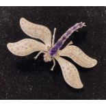 A silver and amethyst dragonfly brooch Modern