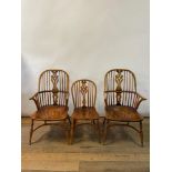 A pair of Windsor style armchairs, and four matching single chairs (6)