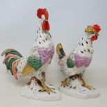 A Continental porcelain model of a cockerel, 28 cm high, and a matching chicken, 22 cm high (2)