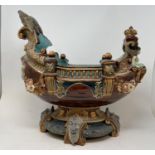 A Wilhelm Schiller & Son majolica centerpiece, in the form of a boat, W S & mark to base and
