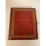 A Victorian photograph and scrap album, Souvenir 1871, in a leather binding with a metal clasp and