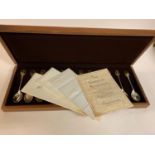 A set of twelve RSPB silver spoons, with certificates, cased, a late Victorian carving set, with