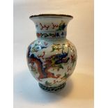 A Chinese porcelain vase, decorated dragons chasing flaming pearl, character mark to neck, 17 cm