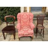 A 19th century deportment chair, a balloon back chair and wing back arm chair (3)