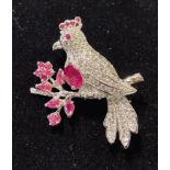 A silver ruby set bird brooch Modern