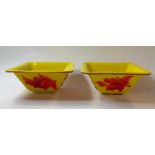 A pair of Chinese Peking style red and yellow glass bowls, 16 cm wide (2) Overall condition good