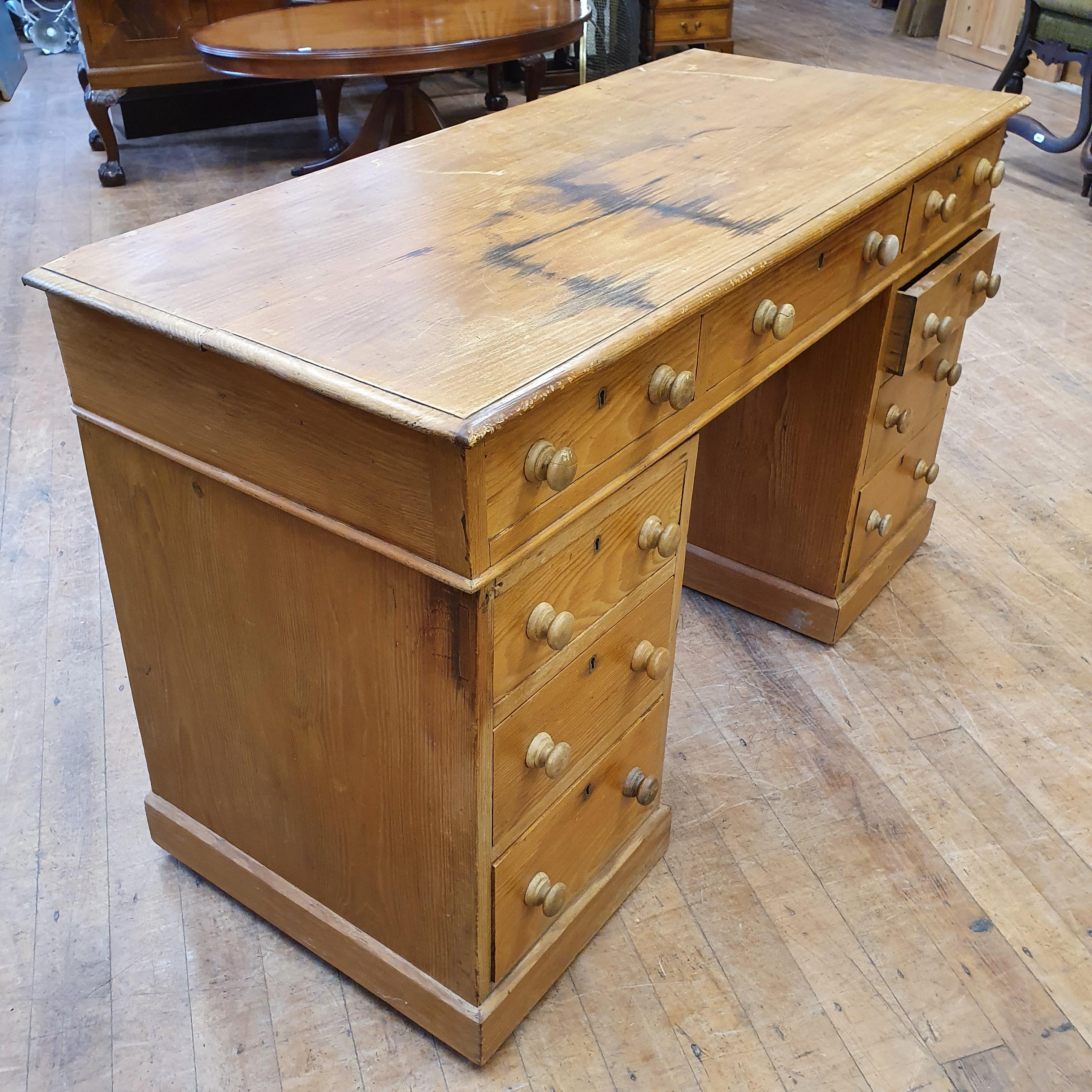 A pine pedestal desk, of nine drawers, 123 cm wide - Image 2 of 4