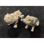 Two miniature silver bulldogs Modern
