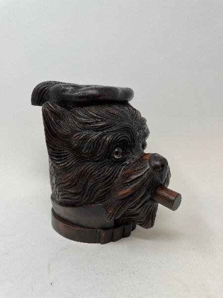 A carved wood tobacco box and cover, in the form of a dog, 18 cm high Modern