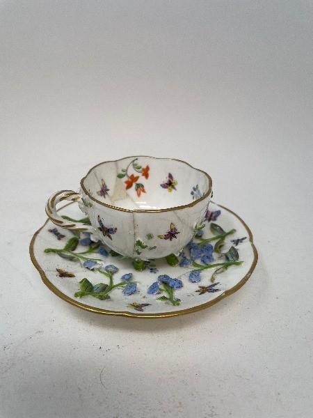 A Meissen cabinet cup and saucer, repaired, other ceramics, a large copper jug and other items (qty)