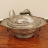 A Chinese pewter tureen and cover, in the form of a goose, with various character marks, 30 cm