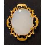 An oval agate brooch, in a metal mount, 7 cm wide