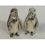 A pair of penguin salt and pepper pots Modern