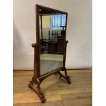 A Victorian mahogany cheval mirror, 167 cm high x 100 cm wide