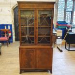 A reproduction mahogany bookcase cabinet, 92 cm wide