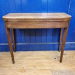 A 19th century mahogany folding tea table, 89 cm wide Top very faded from sun damage