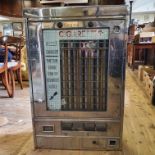 A 20th century Automat wall hanging cigarette dispenser, in a chrome case, 92 x 61 cm