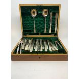 A Victorian silver plated dessert service, comprising of twelve knives, twelve forks with mother