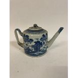 A Chinese famille rose teapot and cover, decorated figures, handle cracked, height 12 cm high, a