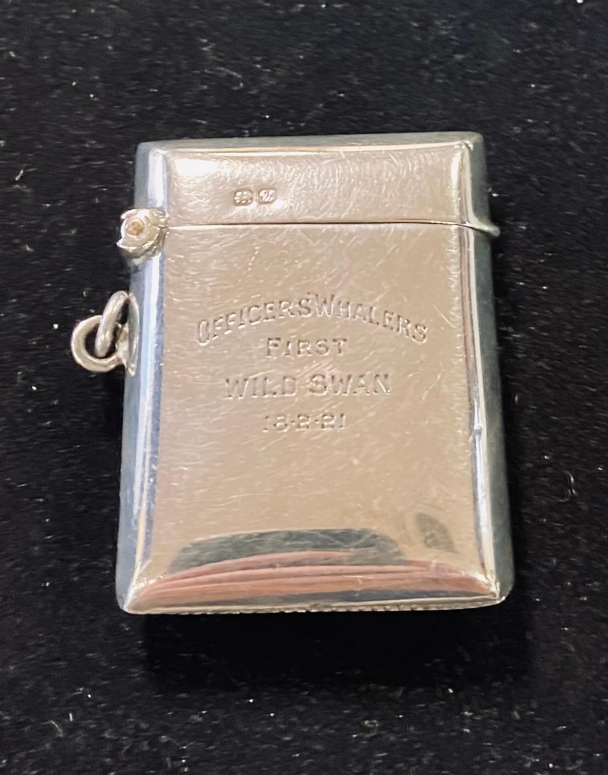 A silver vesta case, inscribed 'Whalers First Wild Swan 18.2.21', Chester 1920