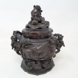 A Japanese bronze koro vase and cover, applied and decorated birds, figures and foliage, signed,