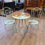 A painted metal garden table and two folding chairs (3) Table diameter 62 cm