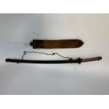 A World War II period Japanese katana sword, in a metal scabbard, 96 cm, and a machete (2)