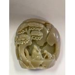 A Chinese hardstone carving, of a man and a monkey underneath a tree, 14 cm high