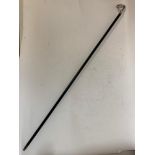 A French walking cane, with a silver coloured metal bird handle with garnet eyes, 86 cm