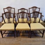 A set of eight 19th century style mahogany dining chairs, with pierced splat backs and padded