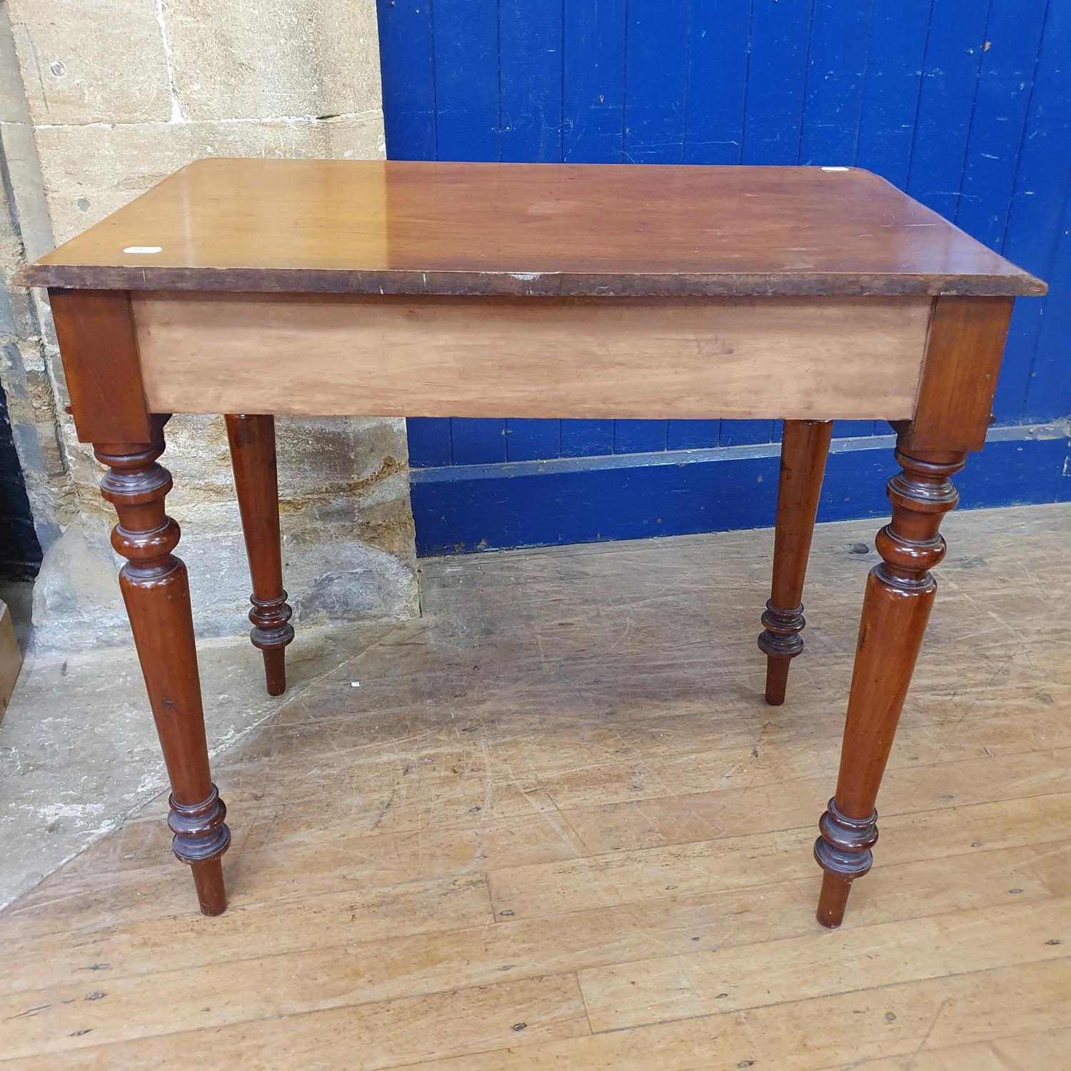 A 1970s mahogany side table, having two frieze drawers, on turned tapering legs, 34 cm - Image 4 of 4