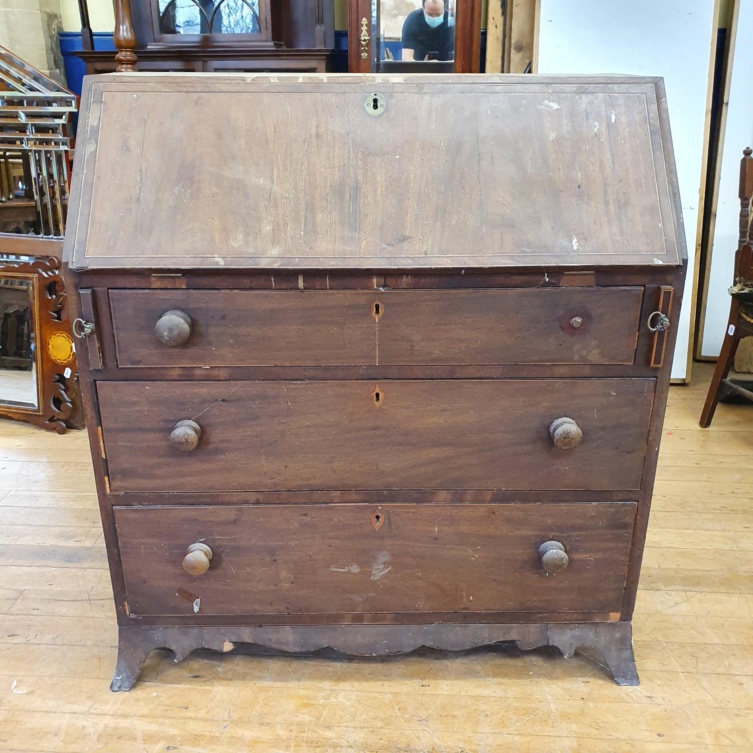 A 19th century mahogany bureau, in need of restoration, 93 cm wide