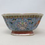 A Chinese famille rose dish, of shaped square form, decorated flowers and foliage, seal mark, some