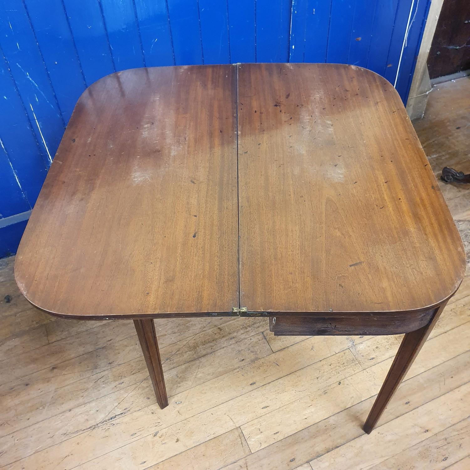 A 19th century mahogany folding tea table, 89 cm wide Top very faded from sun damage - Image 3 of 4