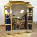 A late 19th, early 20th century overmantle mirror, 140 x 136 cm Various small losses to gesso some