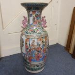 A Chinese famille rose export vase, decorated figures, birds and foliage, riveted and glued, 59.5 cm