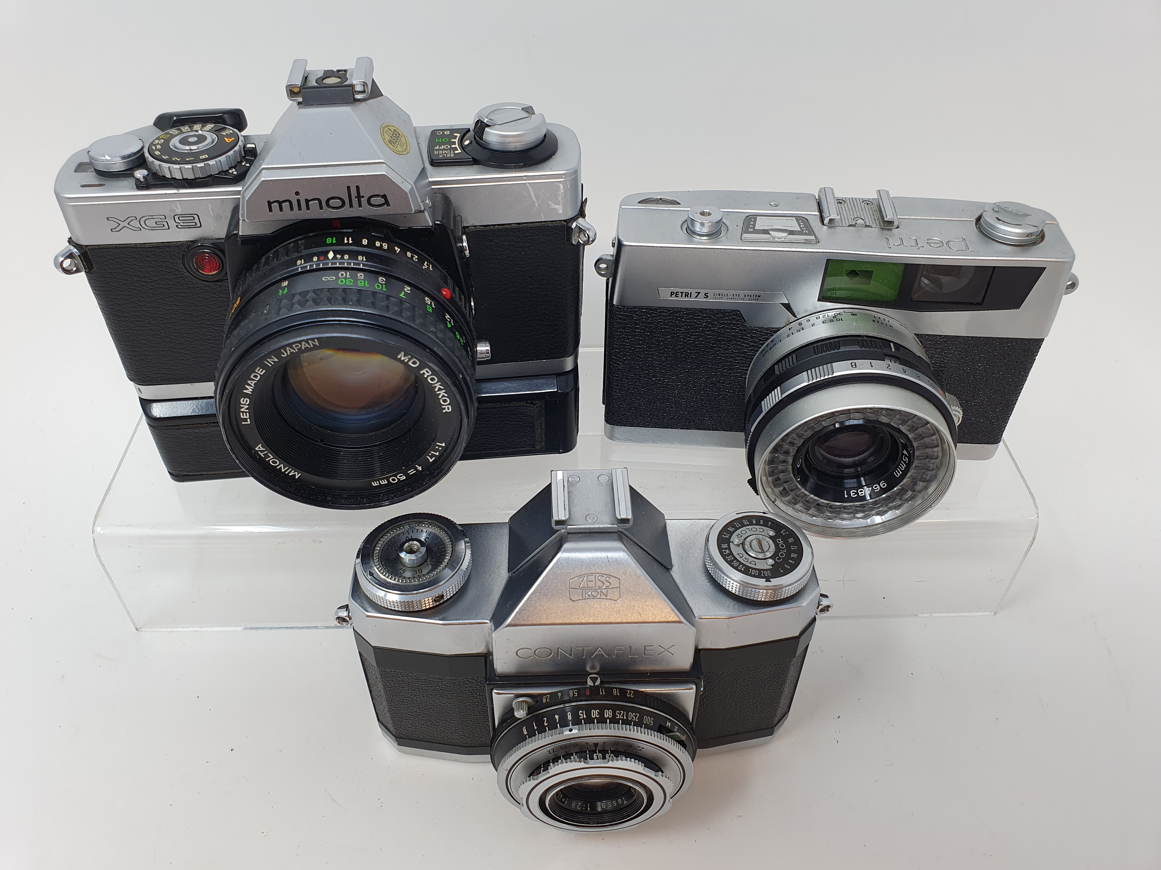 A Zeiss Ikon contaflex camera, a Minolta XG9 camera and a Petri 7S camera (3) Provenance: Part of - Image 2 of 2