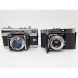 A Voigtlander Vitessa camera, and a Voigtlander Vito II a camera (2) Provenance: Part of a vast