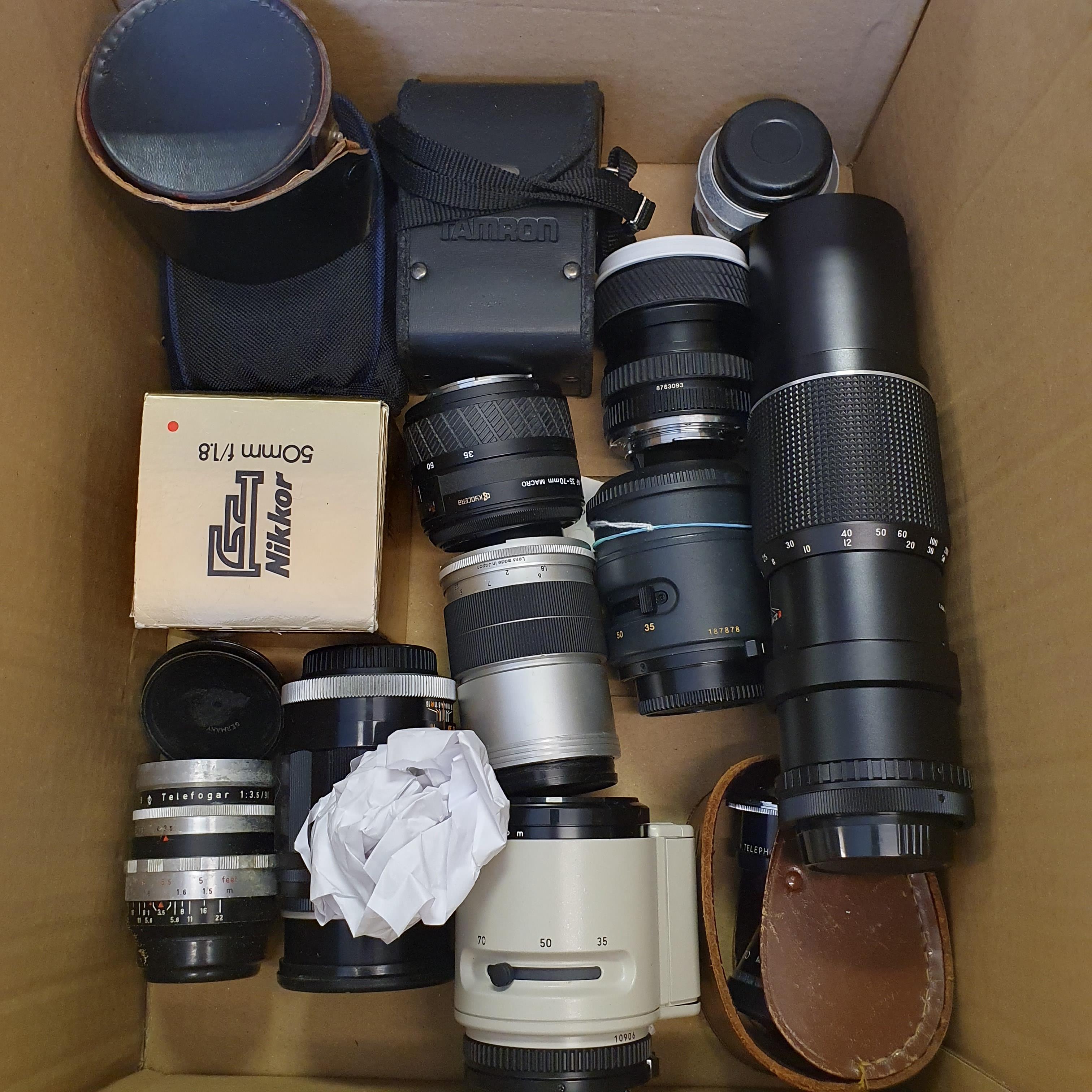 A Steinheil camera lens and various other camera lenses (box) Provenance: Part of a vast single