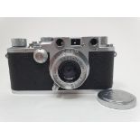 A Leica IIIc camera, serial number 369186, with leather outer case Provenance: Part of a vast single