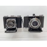 An Olympus-Six folding camera, serial number 21128 and a Duo 620 folding camera (2) Provenance: Part