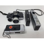 A Minolta 110 Zoom camera, an Agfamatic 6008, and Agfamatic 2000, and a Minolta 470 camera (4)