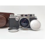 A Leica IIIf camera, serial number 537112, with leather outer case Provenance: Part of a vast single
