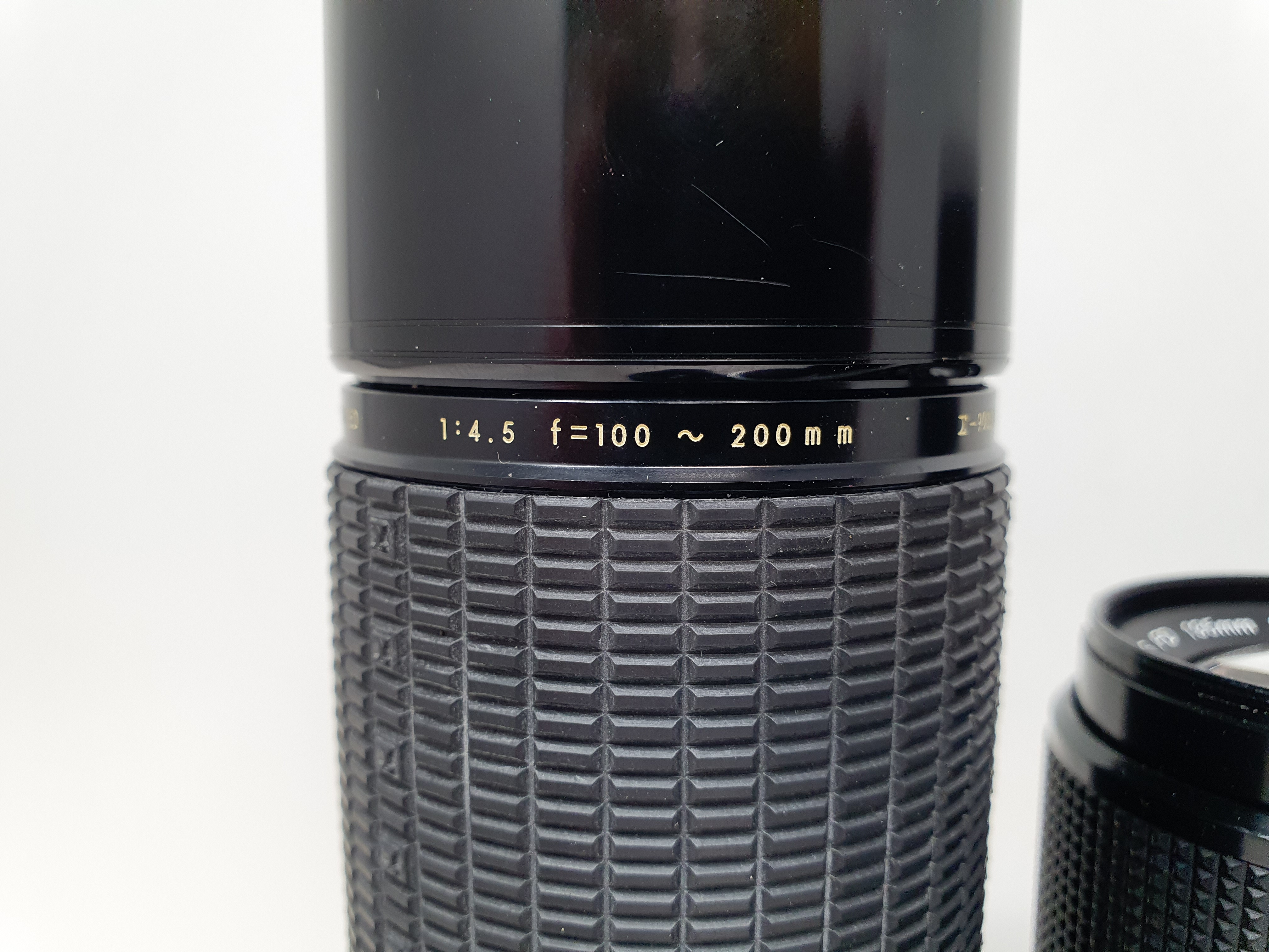 A Sigma camera lens, in outer case, another, three Canon lenses, and a Canon flash, in leather - Image 3 of 10