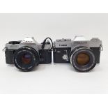 A Canon Pellix camera and a Canon AE-1 camera (2) Provenance: Part of a vast single owner collection