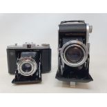 An Epsilon folding camera and a Ziess Ikon Nettar folding camera (2)