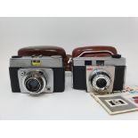 A Kodak Colour Snap 35 camera, in leather outer case, and an Ilford Sportsman camera, in leather