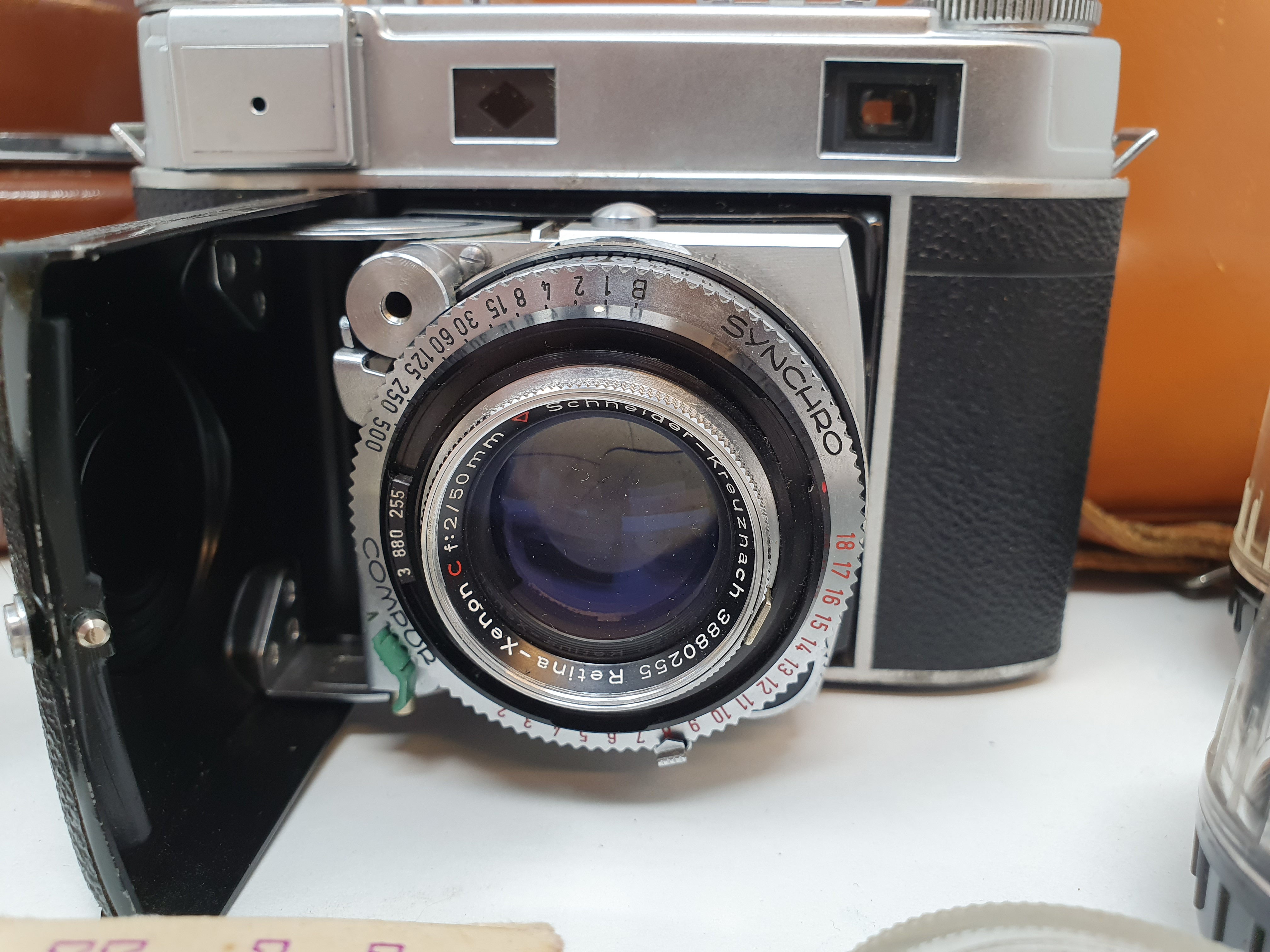 A Kodak Retina III, serial number 231293, in leather outer case, various accessories and lens, in - Image 2 of 6