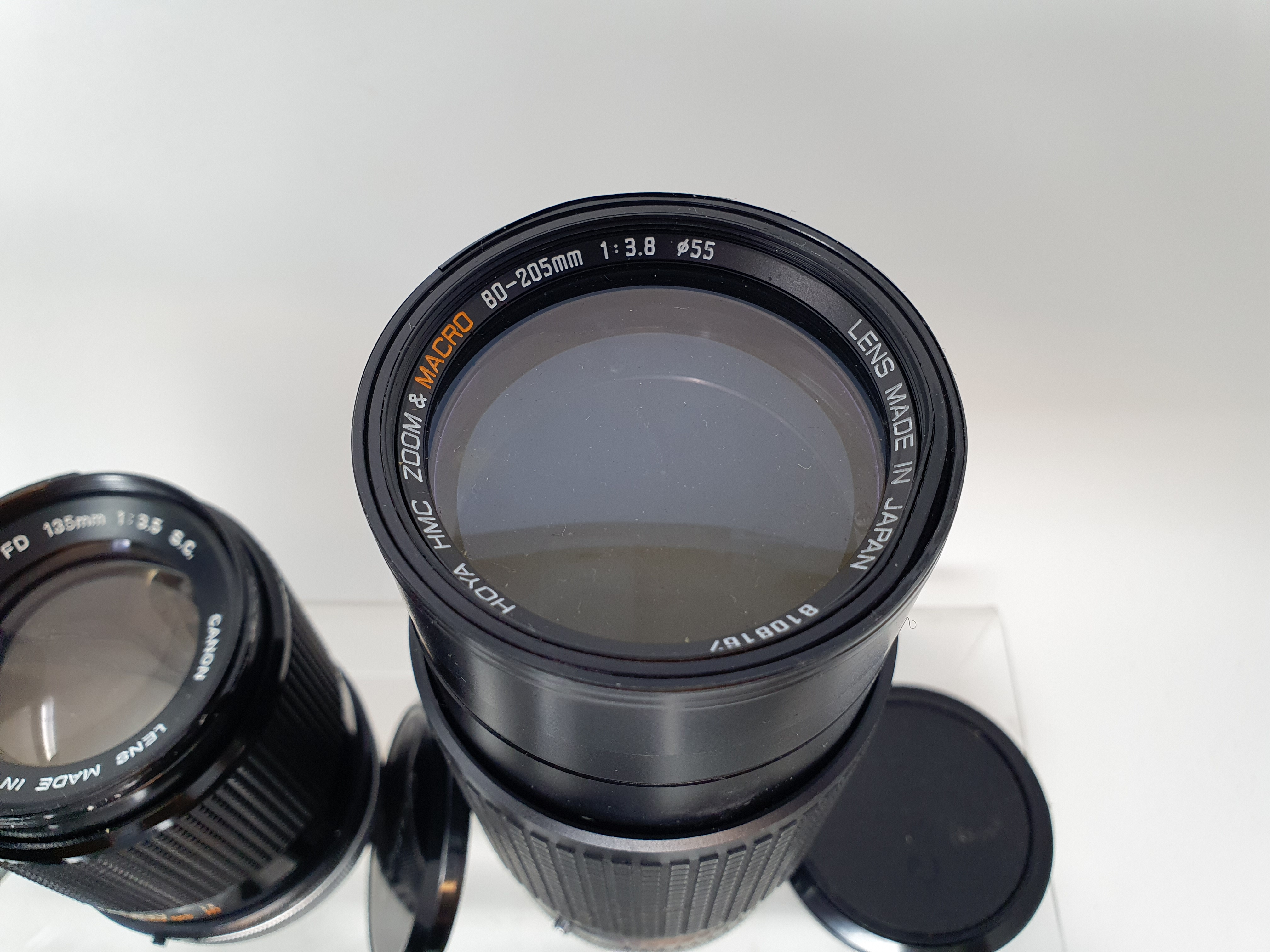 A Sigma camera lens, in outer case, another, three Canon lenses, and a Canon flash, in leather - Image 5 of 10