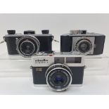 A Kodak 35 camera, a Minolta Hi - Matic F camera, and an Agfa Karat camera (3) Provenance: Part of a